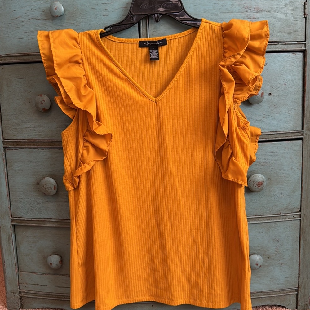 A…love story woman’s top.